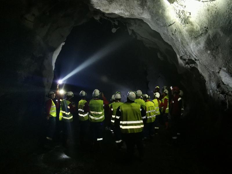 Minetrain students in dark mining tunnel